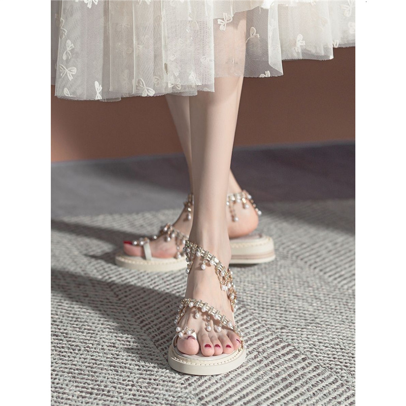 2025S Designer Women's Sandals Temperament Bohemian Feng Shui Diamond Exquisite Flat Sandals Women S Sanya Resort Beach Fairy Shoes With Skirt