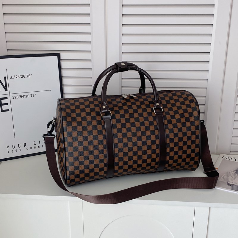 Spring new checked short-distance casual and fashionable large-capacity hand-held travel bag