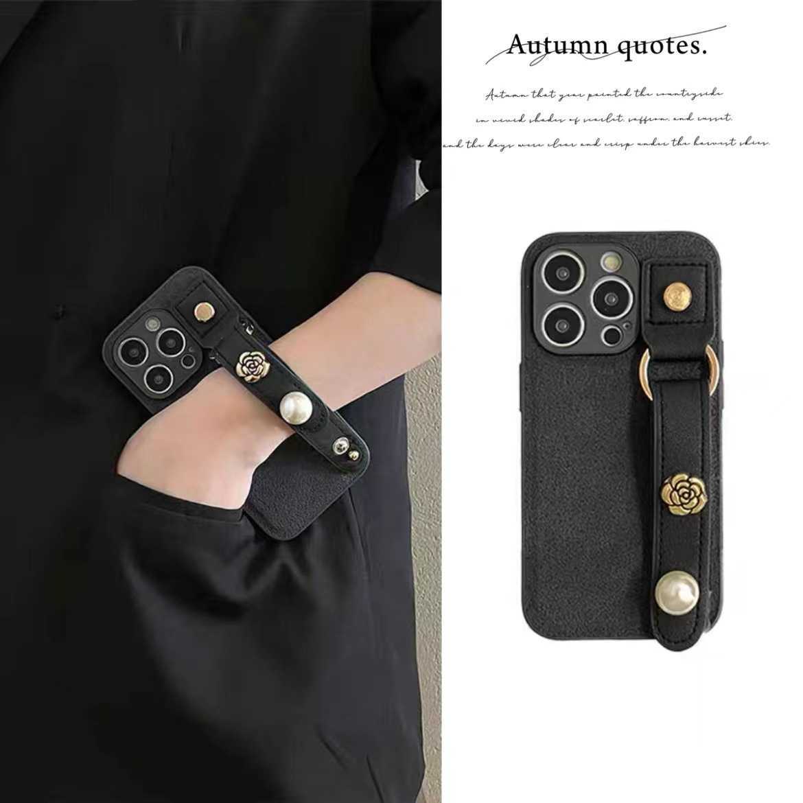 Suitable for 17 Pro Max Phone Case Pearl Camellia Wrist Strap iPhone 16 Protective Cover 15 New Luxury J251202