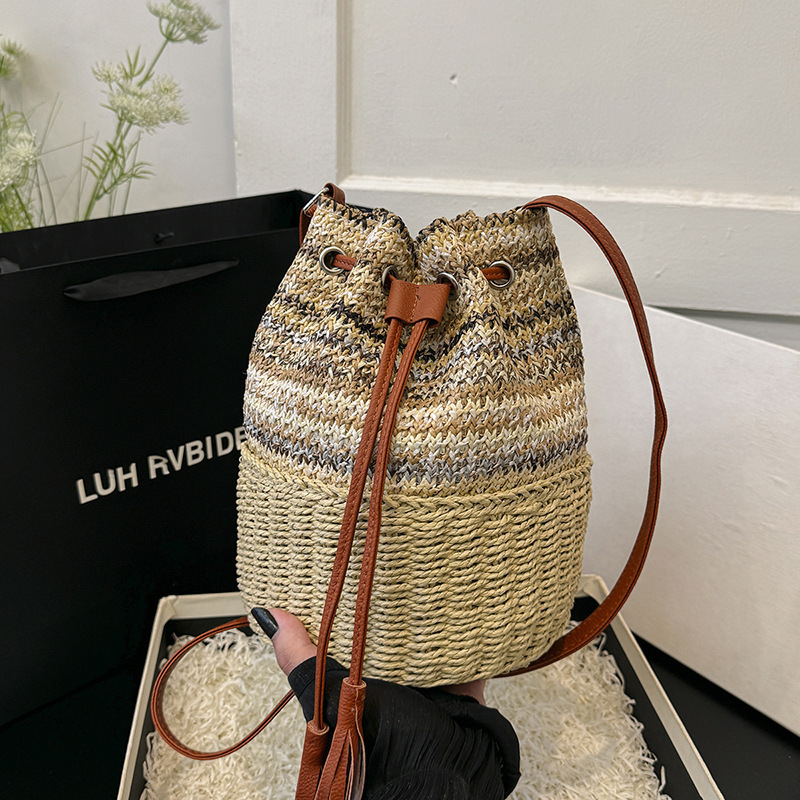 2025S Designer Women S Bag Instagram Bucket Women S Drawstring Single Shoulder Striped Woven Bag Vacation Beach Crossbody Handbag Large Bag
