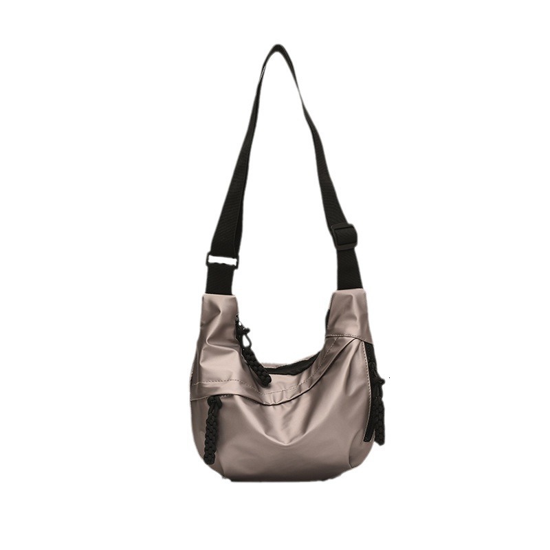 2025S Designer Women S Bag Workwear Style Women S Shoulder Oxford Cloth Ins Canvas Street Large Capacity Artistic Leisure Travel Dumpling Bag