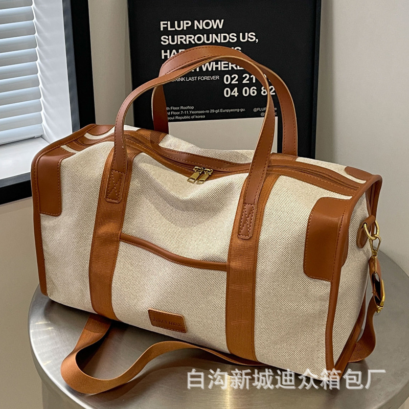 2025S Designer Women S Bag Large Capacity Hand Held Short Distance Women S Lightweight Luggage Bag Men S Leisure Travel Storage Commuting Business Tri