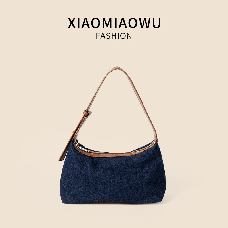 2025S New Model Designer Korean Version Summer New Denim Casual And Artistic Hand Held Shoulder Bag Women S High End PU Niche Style Armpit Bag Totebag