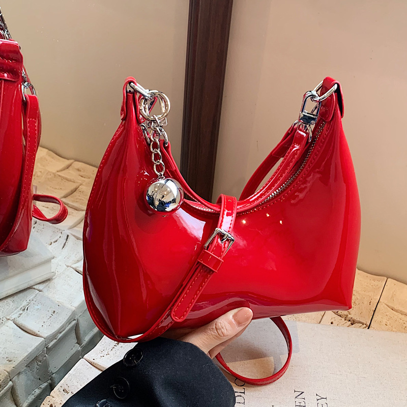 2025S Designer Women S Bag Niche Design Lacquered Underarm New Trendy Shoulder Bag With Bright Face Crossbody Commuter Dumplings For Women