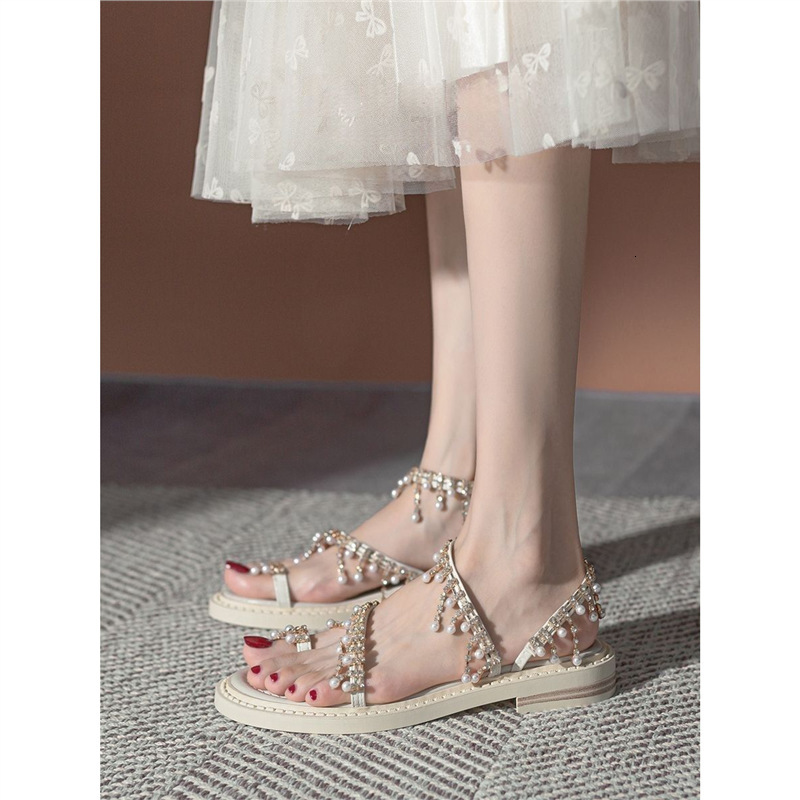 2025S Designer Women's Sandals Temperament Bohemian Feng Shui Diamond Exquisite Flat Sandals Women S Sanya Resort Beach Fairy Shoes With Skirt