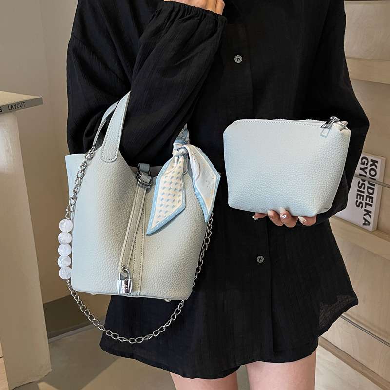 2025S Designer Women S Bag Litchi Patterned Silk Scarf Handbag New Fashionable Bead Crossbody Commuting Versatile Single Shoulder Bucket Bag