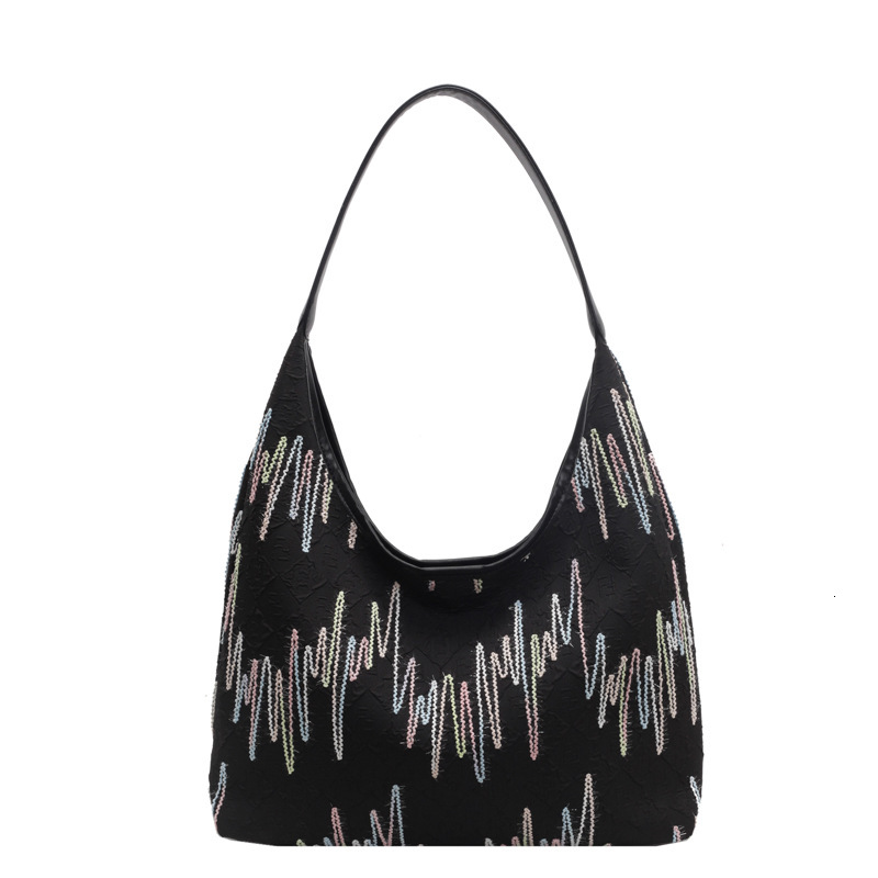 2025S Designer Women S Bag Small Niche Design Canvas Women S Summer Large Capacity New Versatile Armpit Bag High End Single Shoulder Bag