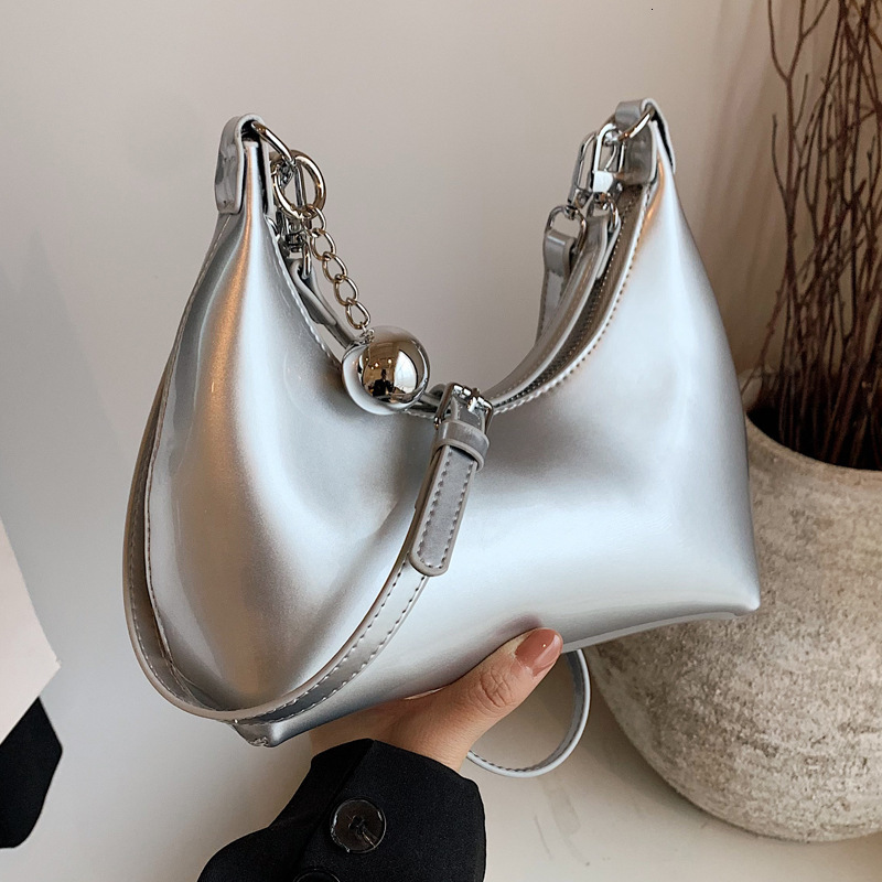 2025S Designer Women S Bag Niche Design Lacquered Underarm New Trendy Shoulder Bag With Bright Face Crossbody Commuter Dumplings For Women