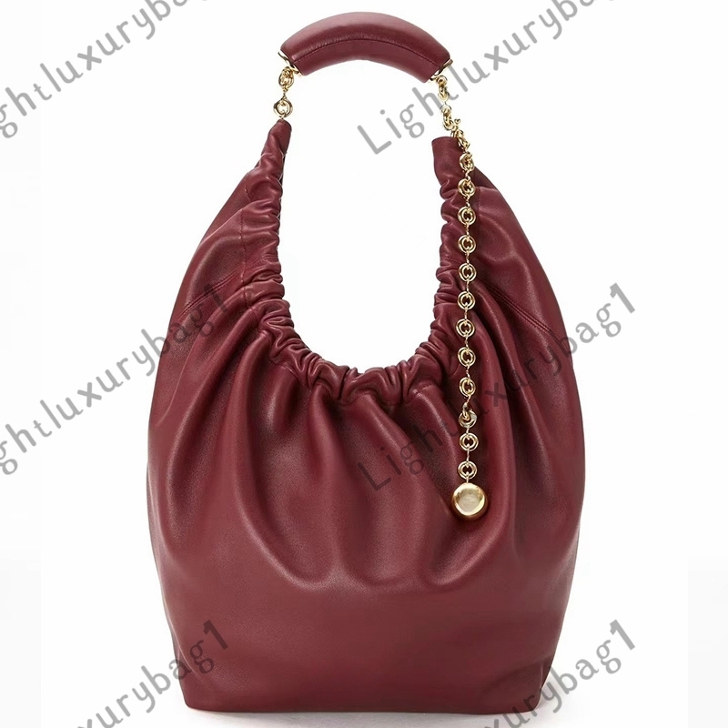 Designer Squeeze Bag In Nappa Lambskin High Quality Handbag With Squeezy Handle And Donut Chain Chic Subaxillary Bag By Magnetic Closure Elegant Shoulder Bag 251220