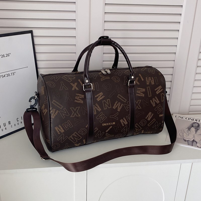 Spring new checked short-distance casual and fashionable large-capacity hand-held travel bag