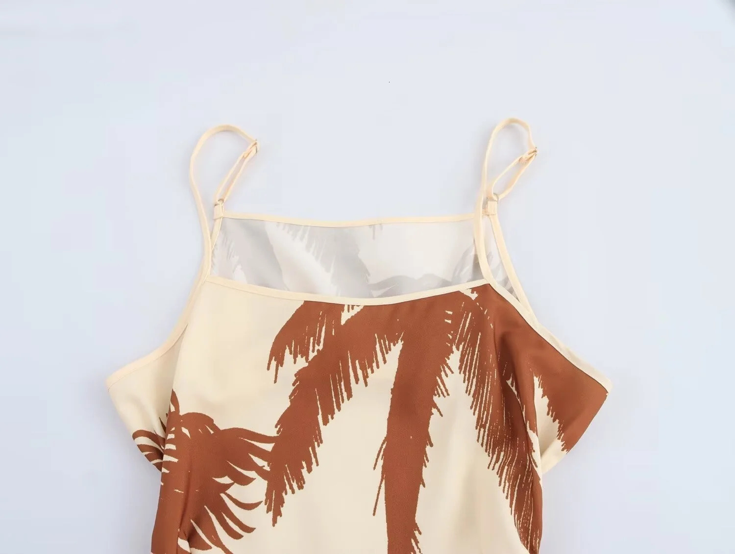 Ladies Maxi dress with tropical plant print and waistband suitable for summer vacation beach wear in 250401