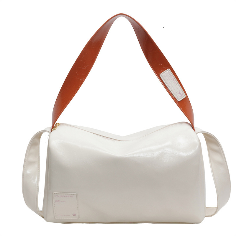 2025S Designer Women S Bag Bag For Women Short Distance Travel Shoulder New Fashion Sense Women S Large Capacity Simple Crossbody Bag