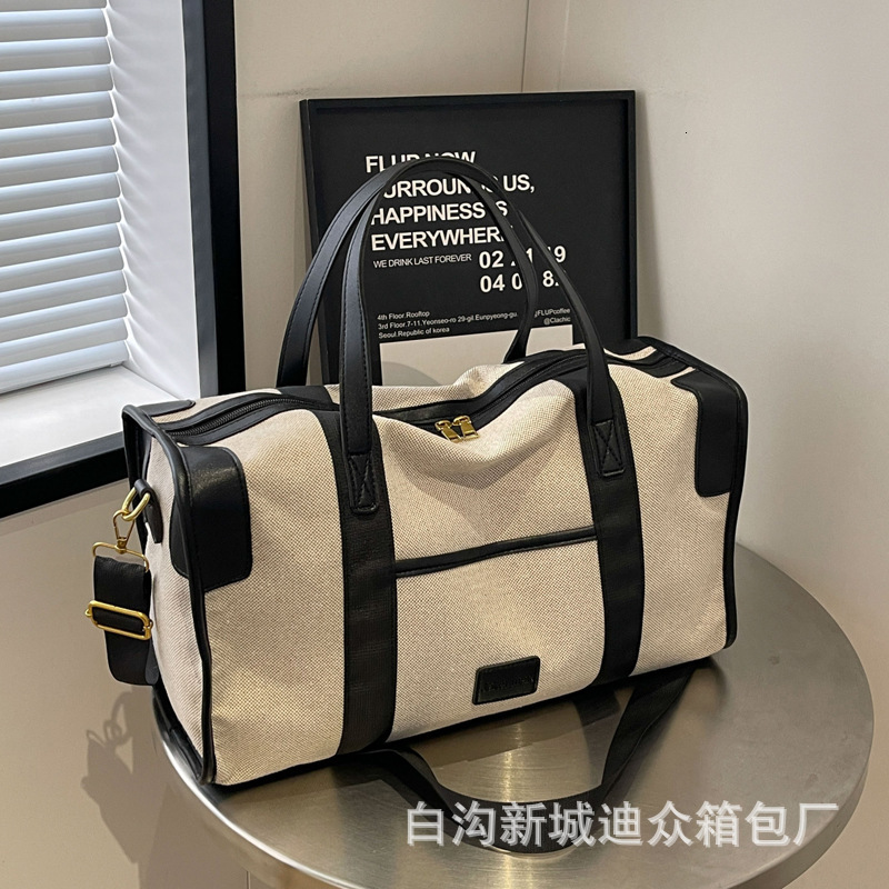 2025S Designer Women S Bag Large Capacity Hand Held Short Distance Women S Lightweight Luggage Bag Men S Leisure Travel Storage Commuting Business Tri