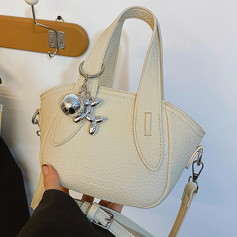 2025S Designer Women S Bag Summer New Product Fashion Niche Design Crossbody Women S Beautiful Handheld Bucket Trendy Versatile Shoulder Bag