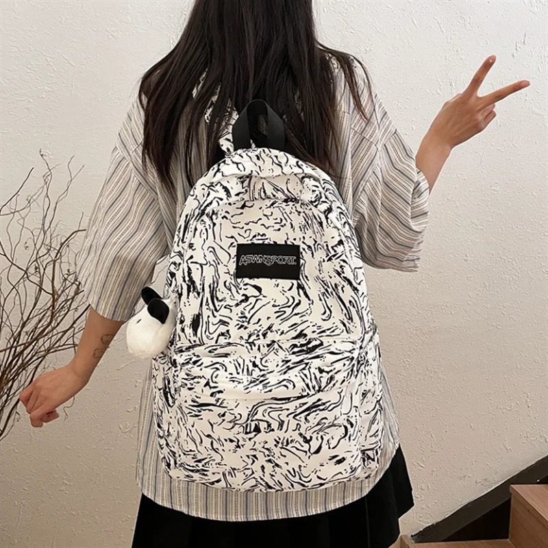 Fashionable and printed commuting backpack suitable for middle school students travel and leisure backpacks with large capacity 250402