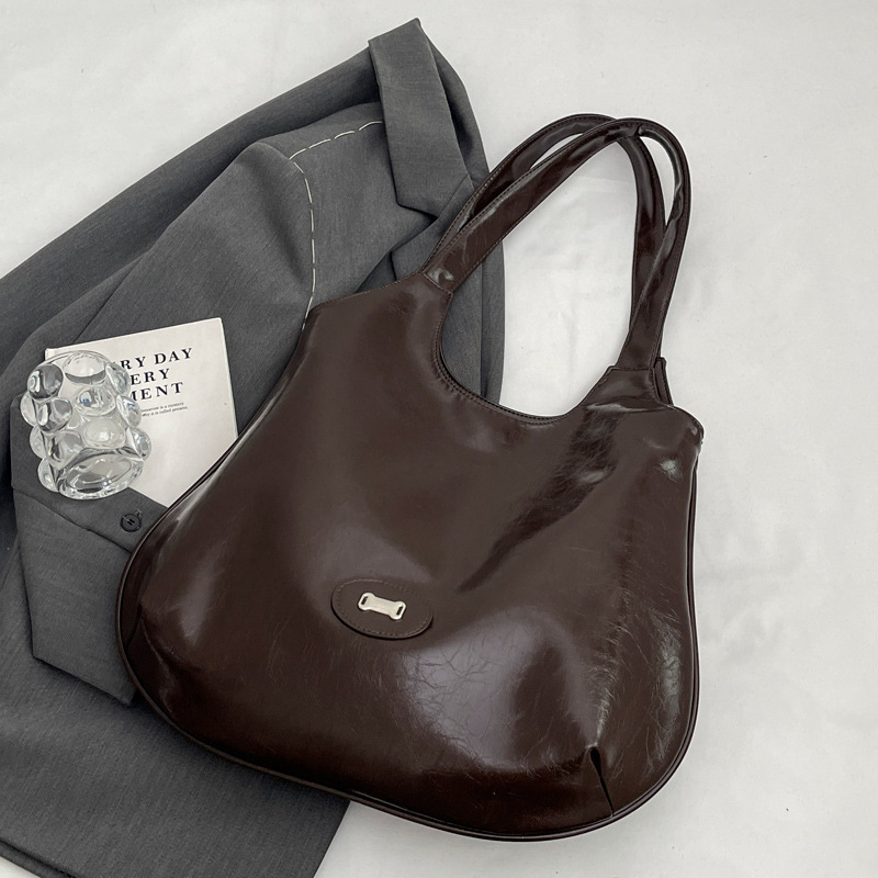 2025S Designer Women S Bag Texture Women S Handbag Summer New Large Capacity Solid Color Shoulder Niche Design Tote Bag