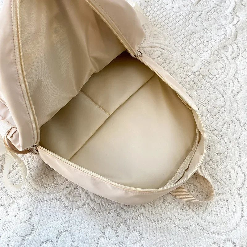 Womens bow white backpack teenage fashion school bag canvas backpack high school nylon letter backpack 250402