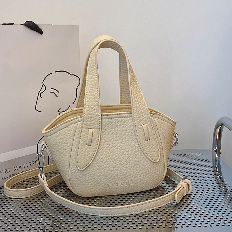 2025S Designer Women S Bag Summer New Product Fashion Niche Design Crossbody Women S Beautiful Handheld Bucket Trendy Versatile Shoulder Bag