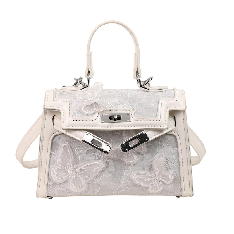 2025S Designer Women S Bag Fashionable And Noble Texture Kelly New Handheld Women S Commuter Ethnic Style Bag