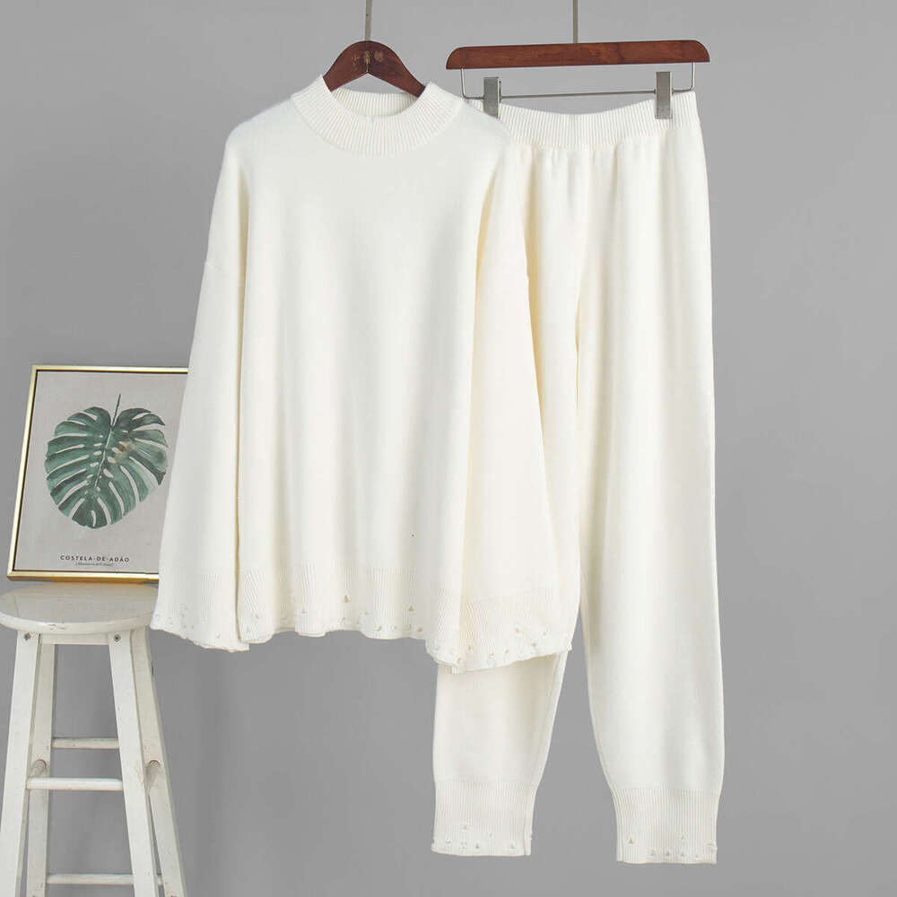 Cross-Border Ripped Women, European American Style, 2025 Autumn and Winter, Ins Style Knitted Skinny Pants + Round Neck Sweater Set for Women