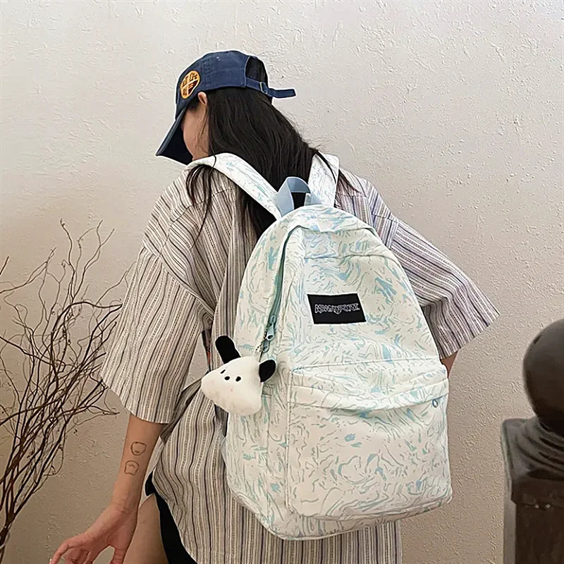 Fashionable and printed commuting backpack suitable for middle school students travel and leisure backpacks with large capacity 250402