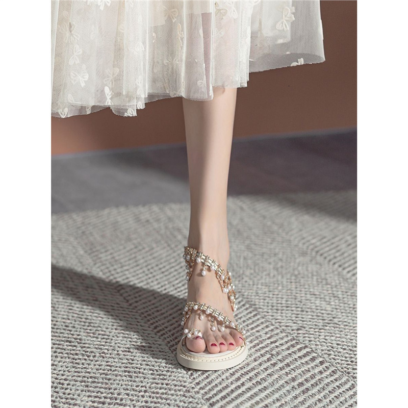 2025S Designer Women's Sandals Temperament Bohemian Feng Shui Diamond Exquisite Flat Sandals Women S Sanya Resort Beach Fairy Shoes With Skirt