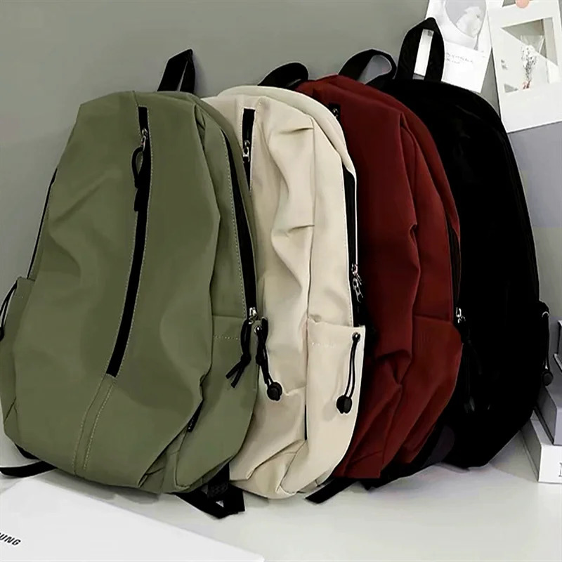Female college student backpack a simple lightweight and stylish travel backpack with large capacity for male high school students 250402