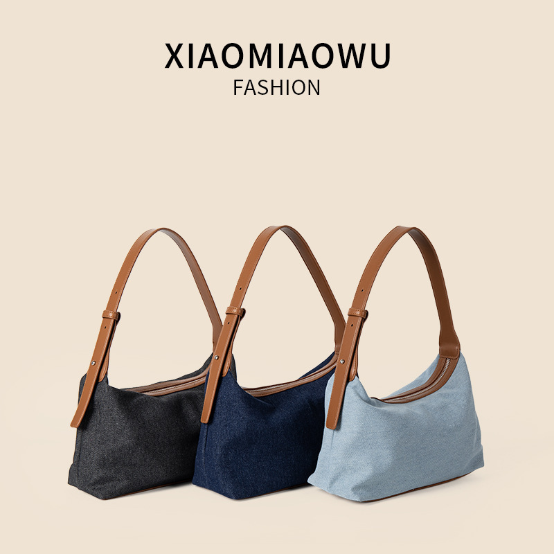 2025S New Model Designer Korean Version Summer New Denim Casual And Artistic Hand Held Shoulder Bag Women S High End PU Niche Style Armpit Bag Totebag