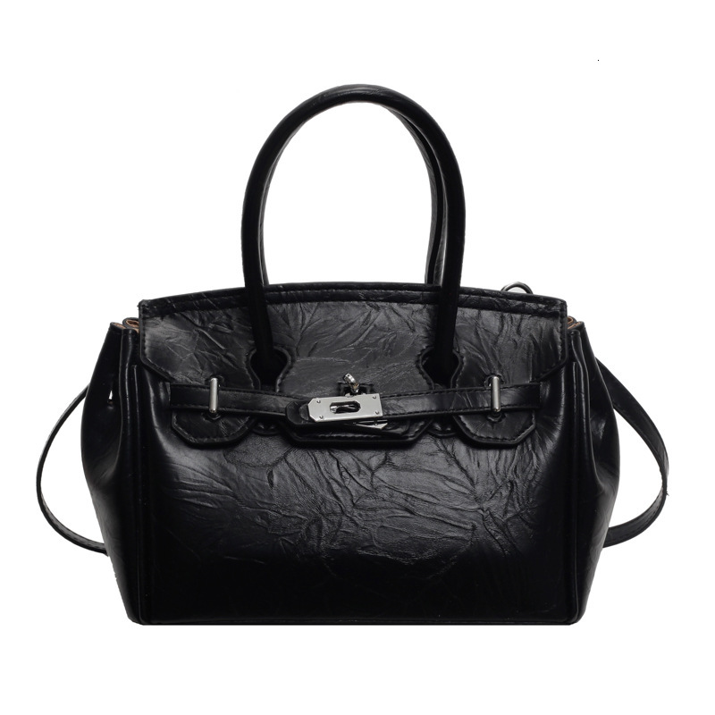 2025S Designer Women S Bag Korean Fashion Handheld Women S Bag Summer New Collection Simple Texture Single Shoulder Kelly Bag Niche Design Diagonal Cr