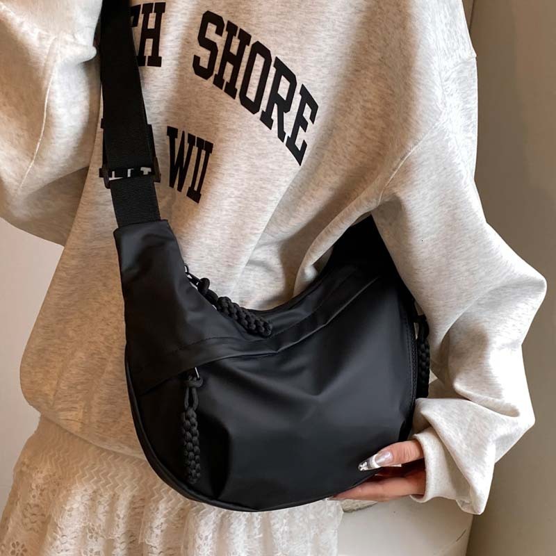2025S Designer Women S Bag Workwear Style Women S Shoulder Oxford Cloth Ins Canvas Street Large Capacity Artistic Leisure Travel Dumpling Bag