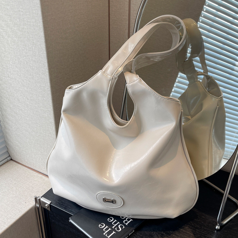 2025S Designer Women S Bag Texture Women S Handbag Summer New Large Capacity Solid Color Shoulder Niche Design Tote Bag