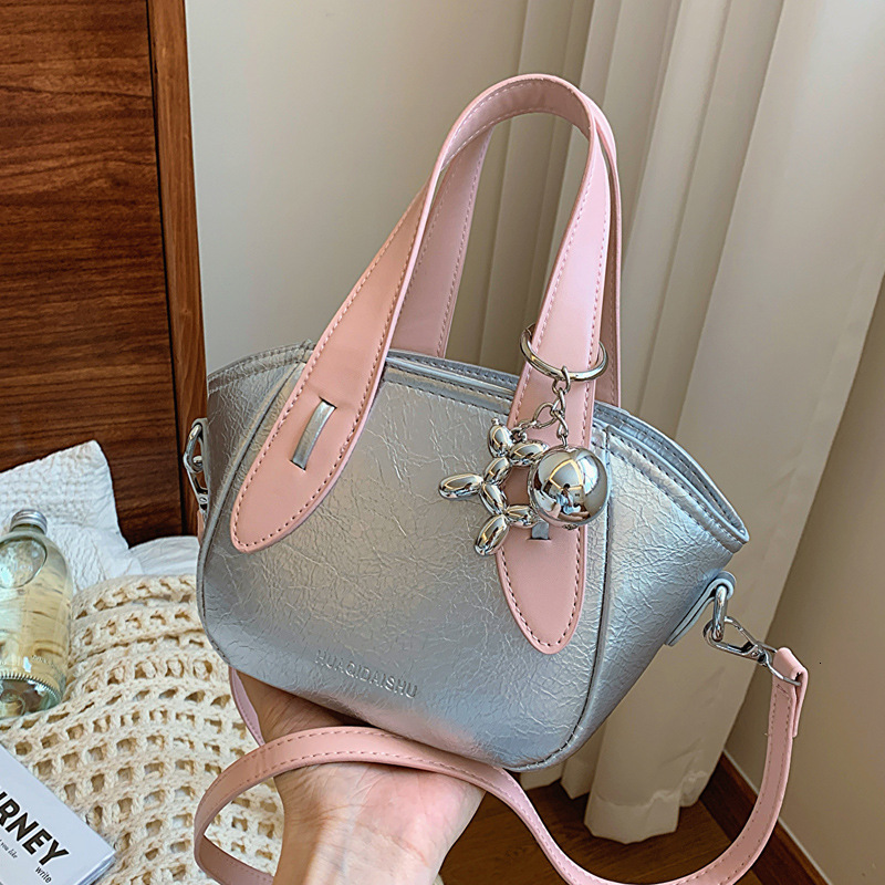 2025S Designer Women S Bag Summer New Product Fashion Niche Design Crossbody Women S Beautiful Handheld Bucket Trendy Versatile Shoulder Bag