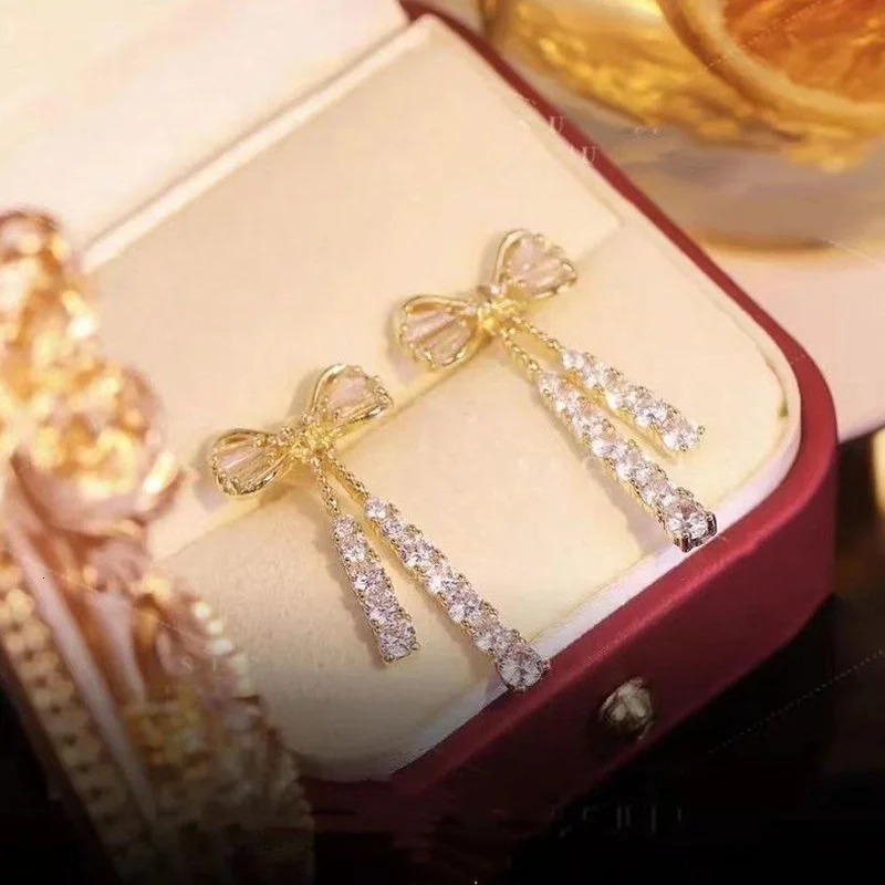 Korean Trend Sparkling Zircon Bowling Long tassel Earrings Suitable for Womens Elegant Crystal Flower Butterfly Pendant 250326