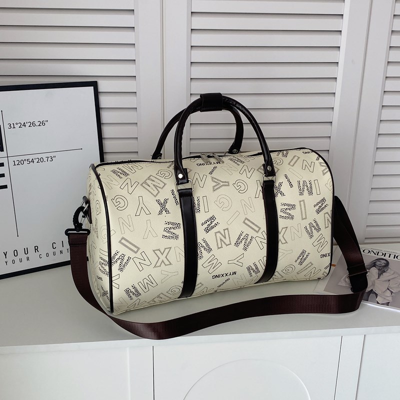 Spring new checked short-distance casual and fashionable large-capacity hand-held travel bag