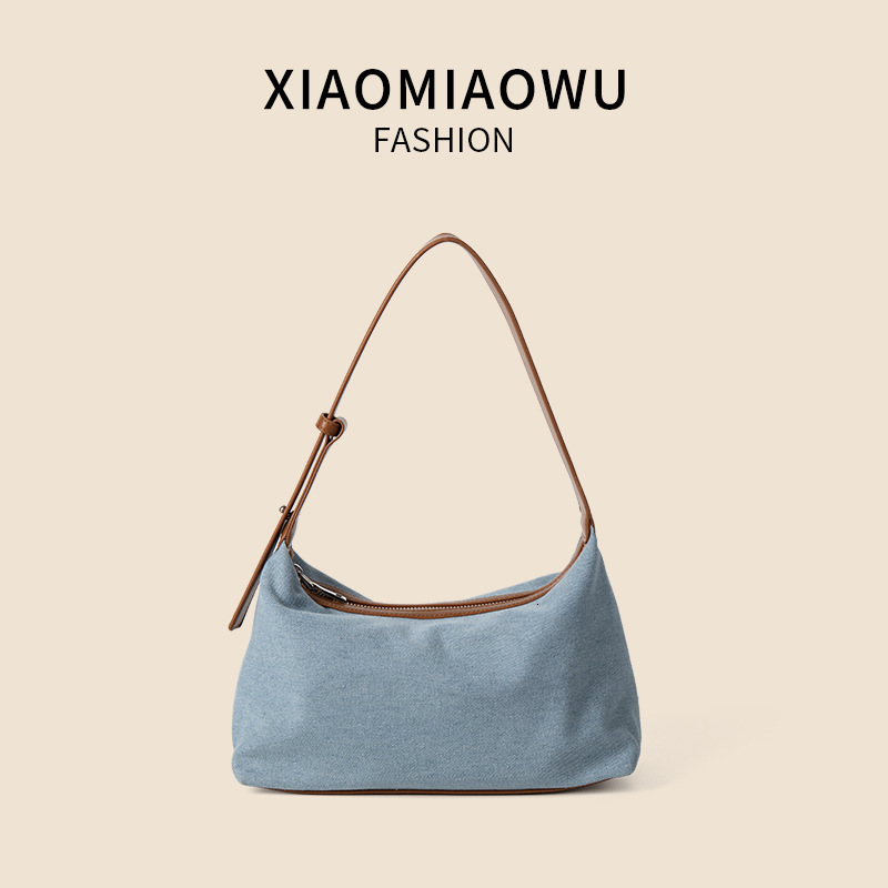 2025S New Model Designer Korean Version Summer New Denim Casual And Artistic Hand Held Shoulder Bag Women S High End PU Niche Style Armpit Bag Totebag
