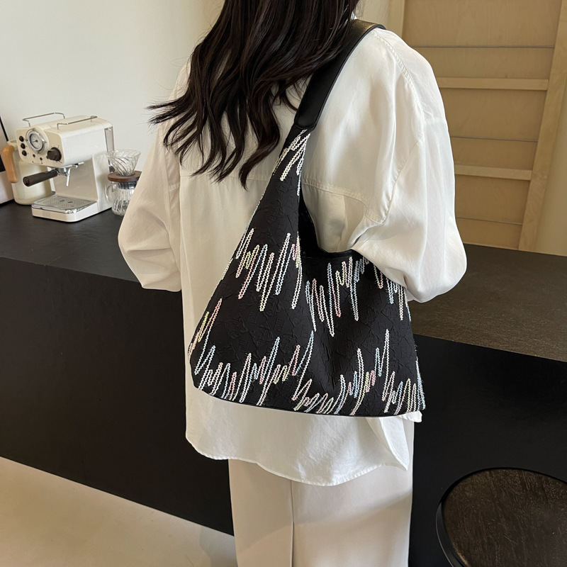 2025S Designer Women S Bag Small Niche Design Canvas Women S Summer Large Capacity New Versatile Armpit Bag High End Single Shoulder Bag