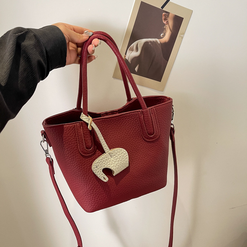 2025S New Model Designer Bag Advanced Bubble Leather New Fashion Bucket For Women Ins Casual Shoulder Bag Totebag
