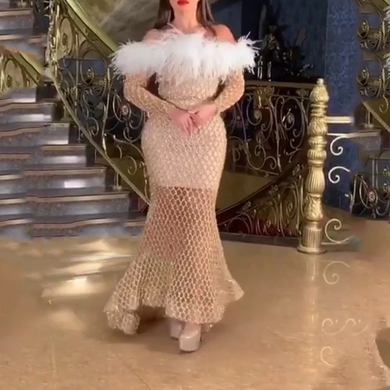 2025 New Womens Dress Long Sleeved Hollow Out Long Skirt Sprinkled with Gold Feathers and Wrapped Buttocks Dress