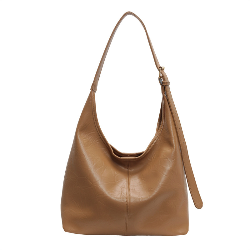 2025S Designer Women S Bag Single Shoulder Tote Summer New Trend Fashion Versatile Casual Commuting Underarm Bag