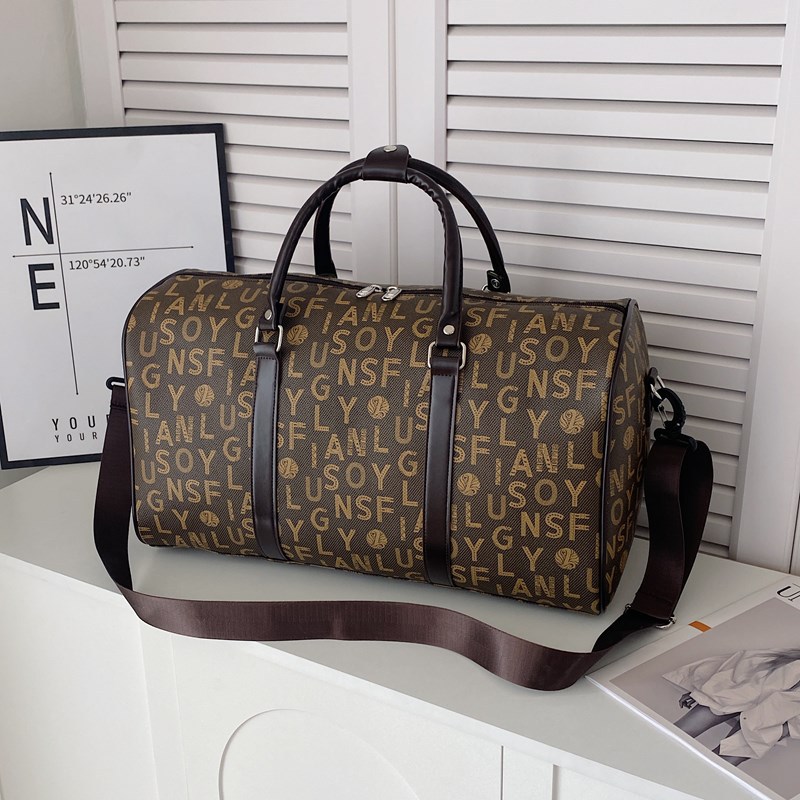 Spring new checked short-distance casual and fashionable large-capacity hand-held travel bag