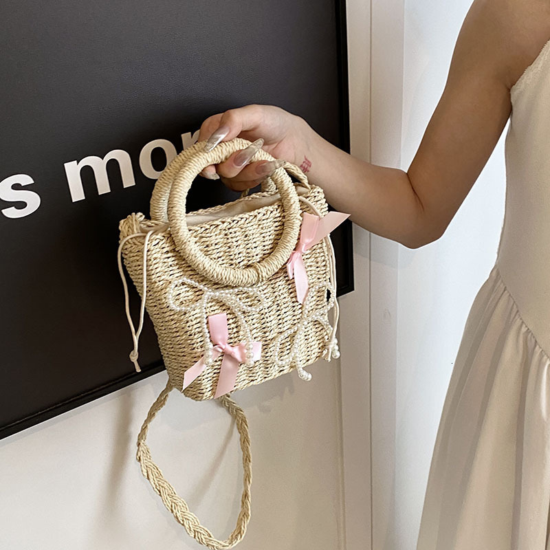 2025S Designer Women S Bag Handmade For Women New Trend Handbag Single Shoulder Crossbody Bag Fashionable Water Bucket Grass Woven Beach Bag