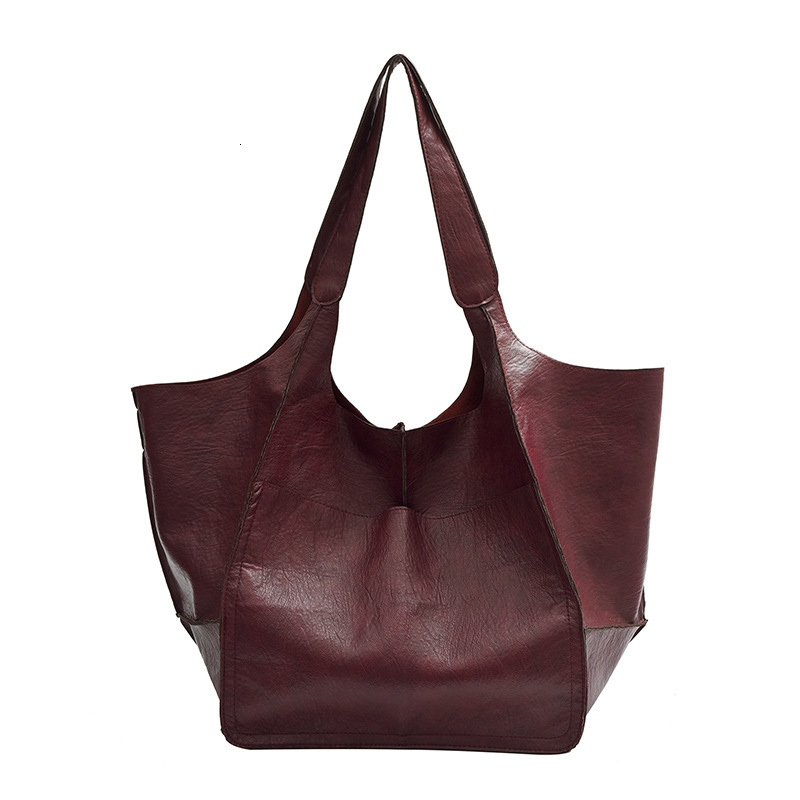 2025S Designer Women S Bag Minimalist New Underarm Soft Leather Large Capacity Shoulder Handheld Solid Color Versatile Tote Bag