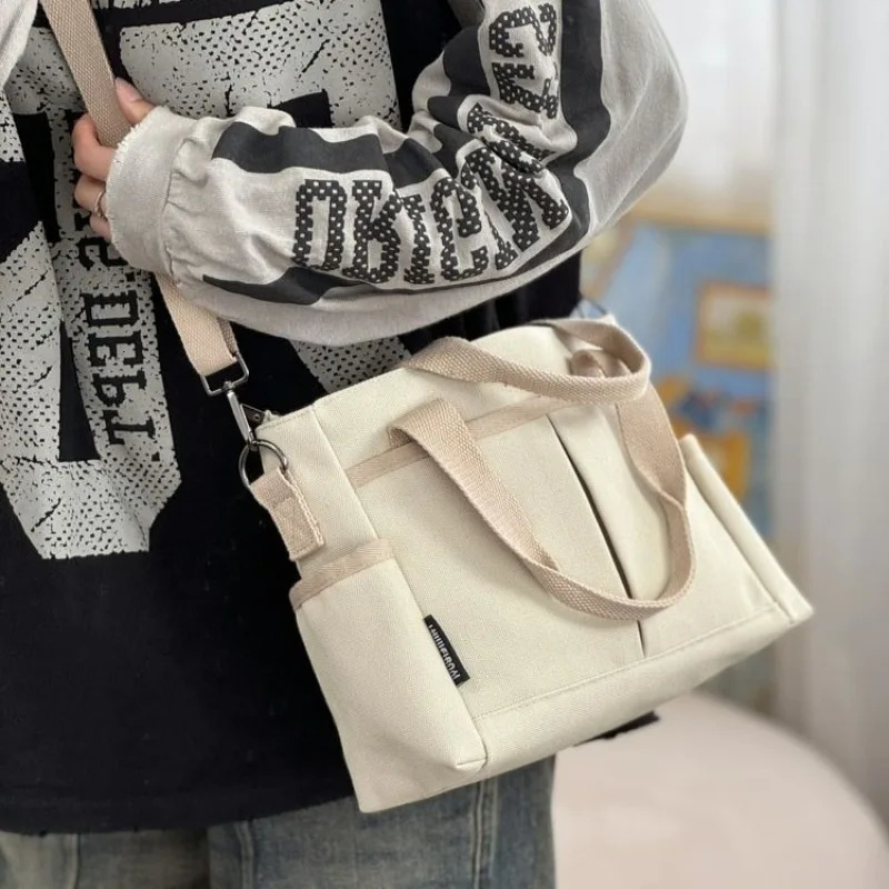 Womens canvas handbag multifunctional large capacity horizontal bag student leisure commuting 250401