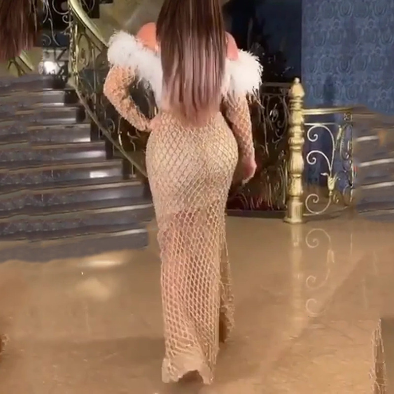 2025 New Womens Dress Long Sleeved Hollow Out Long Skirt Sprinkled with Gold Feathers and Wrapped Buttocks Dress