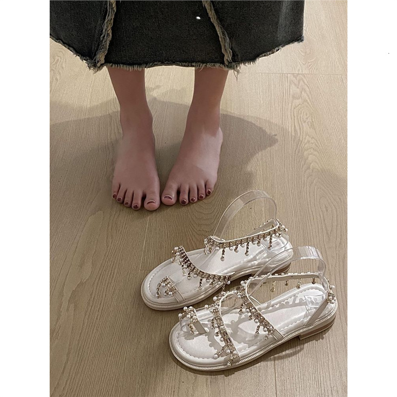 2025S Designer Women's Sandals French Bohemian Style Shoe Set Toe Clip Sandals New Summer Flat Bottomed Beach Shoes With Rhinestones And Pearls
