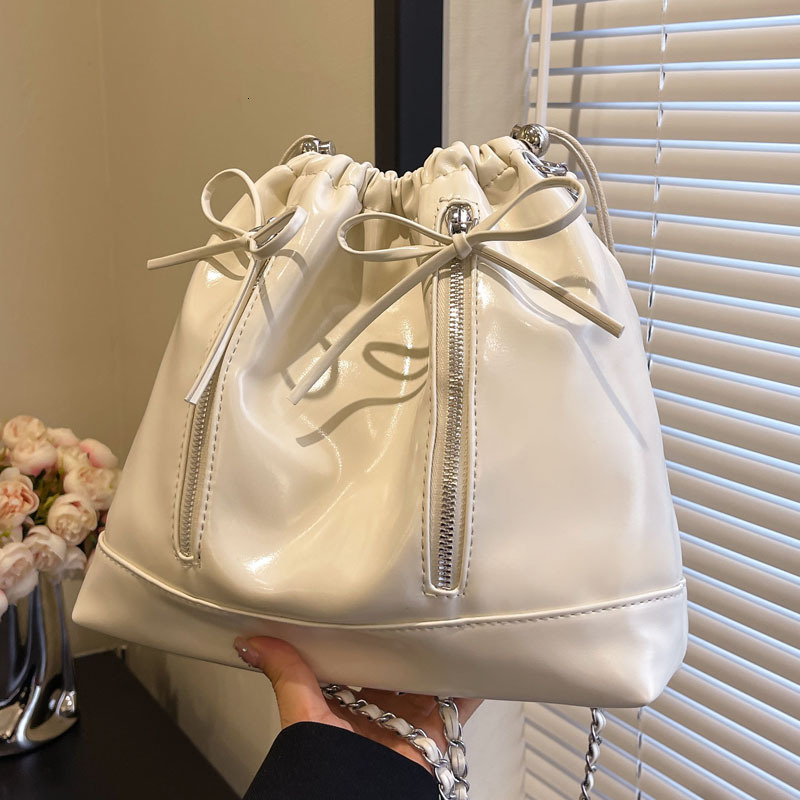 2025S Designer Women S Bag Fashionable And Minimalist Bucket Niche Design Drawstring Backpack High End Travel Shopping Crossbody Bag