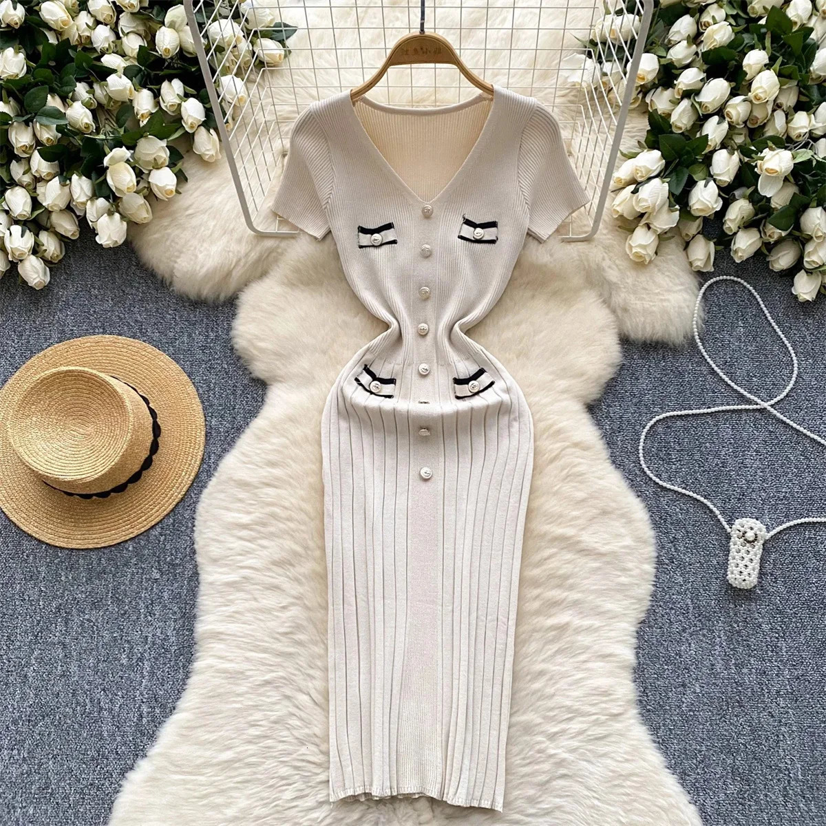 Elegant and fashionable knitted long dress for women short sleeved single chest V-neck dress office women summer tight vest casual 250402