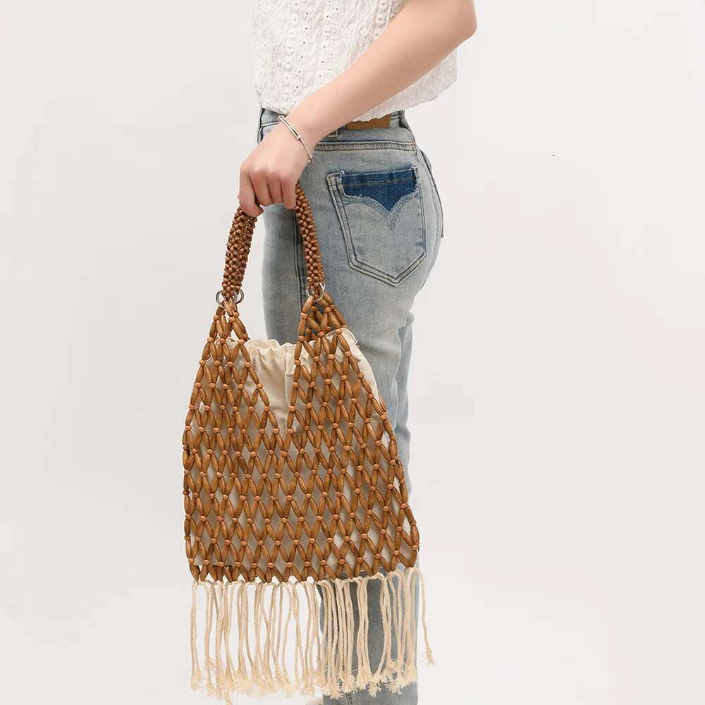 NEW Women Woven Tassels Design Hollow-Out Wooden Bead Tote Bucket Shoulder Bag Female Reticulate Netted Canvas Beach Handbag