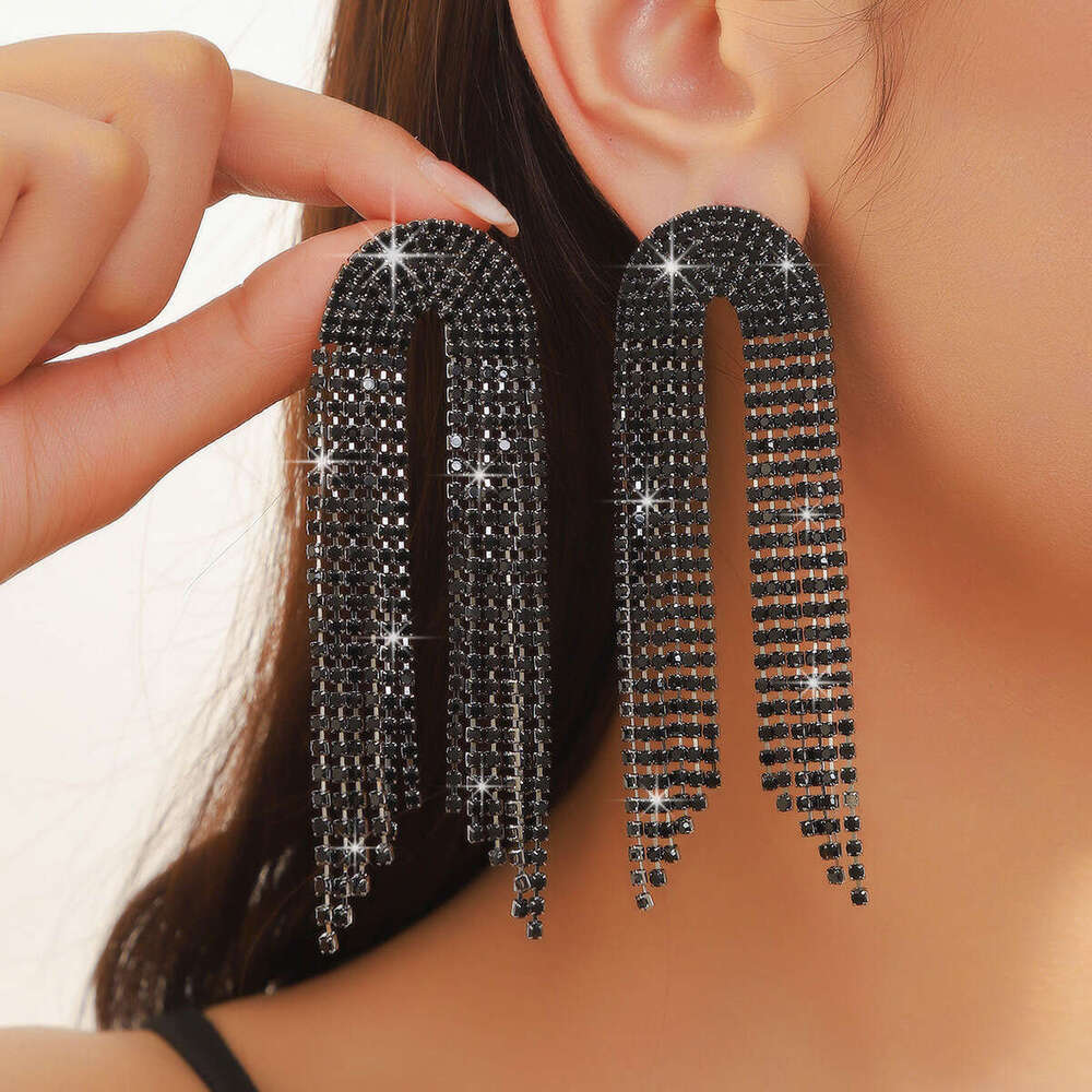 Hot selg with exaggerated high-end feel, light claw chain earrings, long rhie tassels, personalized girl earrings