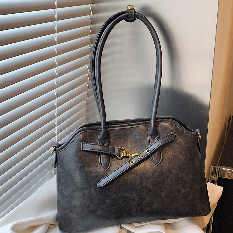 2025S Designer Women S Bag French Minimalist Single Shoulder Women S With Versatile Texture Underarm Briefcase Niche Design Hand Held Shell Bag